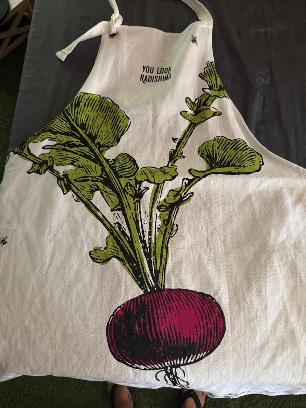 Two's Company White Apron with Green Leaves and Pink Radish Illustration